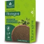 Natural green Bhringraj powder close-up for herbal hair care